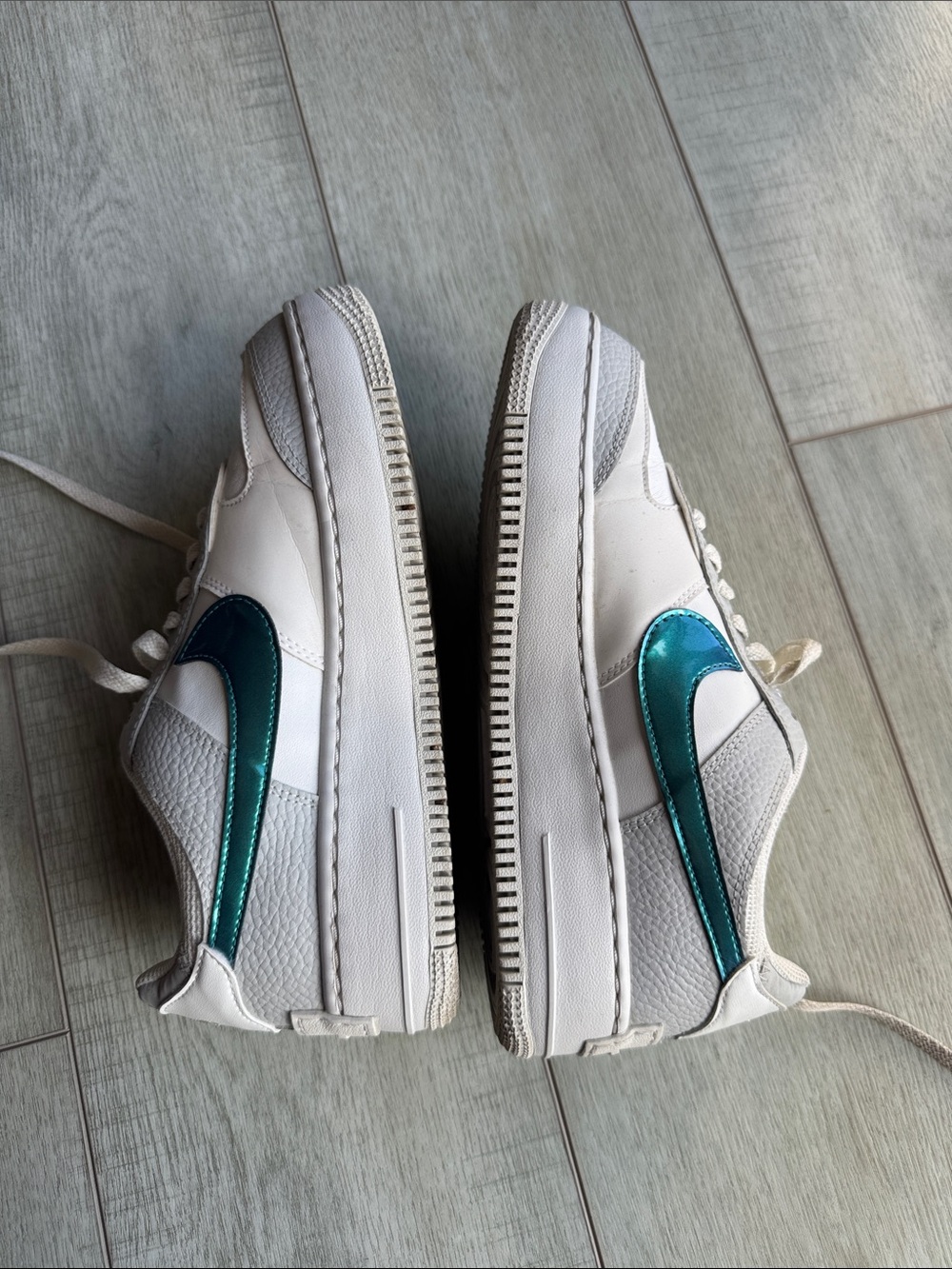 Nike Kids White Sneakers with Teal Metallic Swoosh